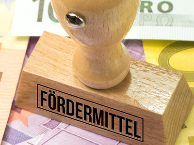 Finanzielle Förderung, Geld, Münzen, Euro, Hilfsprogramm, Zuschuss, Kredit